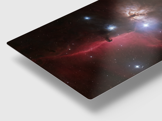 Angled close-up of Horsehead Nebula metal print, highlighting the high-gloss sheen and smooth 1/8 inch rounded corners.
